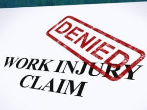 Workers compensation claim denied with stamp