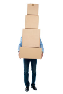 Man carrying heavy boxes